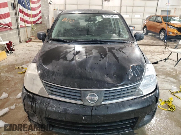 2009 Nissan Versa 1.8 SL with VIN 3N1BC13E39L351372, listed as a Copart auction lot 87274254 with 147,733 mi miles and Salvage Title. Bid and sale history available at carsss.com. Image 5.