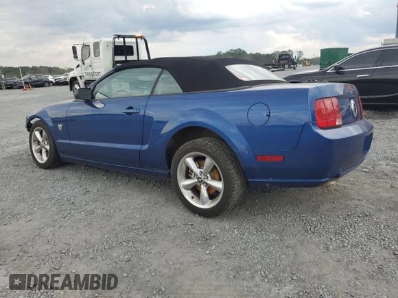 2009 Ford Mustang GT with VIN 1ZVHT85H795103954, listed as a Copart auction lot 73303774 with 28,129 mi miles and Salvage title. Bid and sale history available at DreamBid. Image 2.
