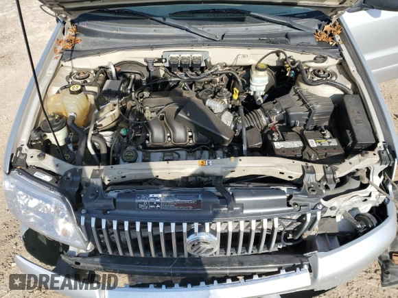 2005 Mercury Mariner Luxury z VIN 4M2YU56195DJ03528, wystawiony jako Copart lot #83315034 z przebiegiem 118 696 mil mil oraz Szkoda całkowita • Salvage title. Historia ofert i sprzedaży dostępna na DreamBid. Obrazek 13.