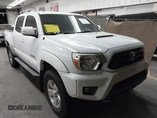 2014 Toyota Tacoma PreRunner z VIN 3TMJU4GN9EM172517, wystawiony jako IAAI lot #42257530 z przebiegiem 184 449 mil mil oraz . Historia ofert i sprzedaży dostępna na DreamBid. Obrazek 1.