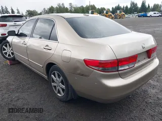 2004 Honda Accord EX with VIN 1HGCM66514A061236, listed as a IAAI auction lot 42565461 with 214,605 mi miles and . Bid and sale history available at DreamBid. Image 3.
