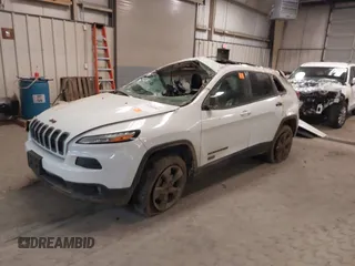 2016 Jeep Cherokee Latitude with VIN 1C4PJMCS1GW314036, listed as a IAAI auction lot 41303805 with 121,551 mi miles. Bid and sale history available at carsss.com. Image 17.