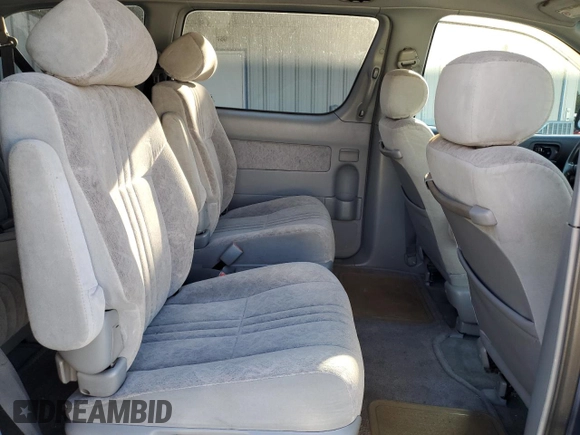 1999 Toyota Sienna LE with VIN 4T3ZF13C8XU108650, listed as a Copart auction lot 74476004 with 215,060 mi miles and Salvage Title. Bid and sale history available at carsss.com. Image 11.