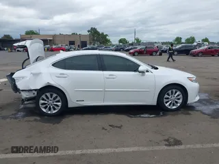 2014 Lexus ES 300h with VIN JTHBW1GG5E2064531, listed as a IAAI auction lot 42119900 with 210,354 mi miles and . Bid and sale history available at DreamBid. Image 13.