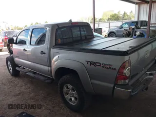2014 Toyota Tacoma with VIN 3TMLU4EN3EM162738, listed as a IAAI auction lot 41871226 with 135,318 mi miles and . Bid and sale history available at DreamBid. Image 15.