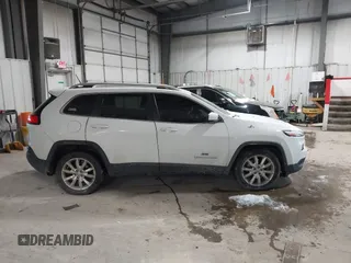 2014 Jeep Cherokee Limited with VIN 1C4PJLDS3EW283569, listed as a IAAI auction lot 41589298 with 128,307 mi miles. Bid and sale history available at carsss.com. Image 13.