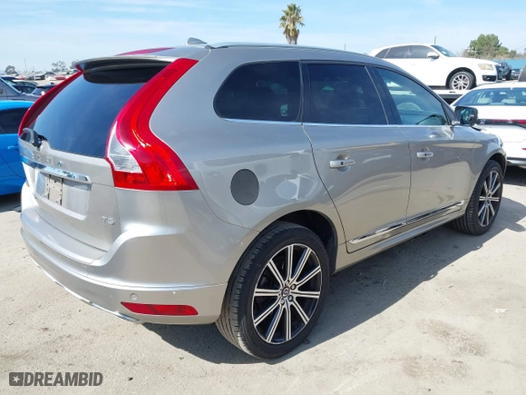 2016 Volvo XC60 T5 Drive-E Premier with VIN YV440MDK1G2854334, listed as a IAAI auction lot 41580888 with 49,765 mi miles. Bid and sale history available at carsss.com. Image 4.