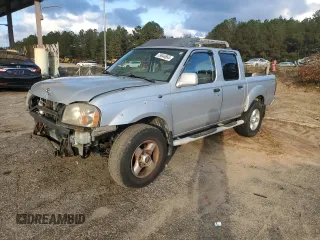 2001 Nissan Frontier SE z VIN 1N6ED27T41C306024, wystawiony jako Copart lot #79644664 z przebiegiem 132 703 mil mil oraz Szkoda całkowita • Salvage title. Historia ofert i sprzedaży dostępna na DreamBid. Obrazek 1.