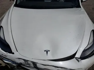 2023 Tesla Model 3 with VIN 5YJ3E1EA9PF401418, listed as a Copart auction lot 50597015 with 79,673 mi miles and Salvage Title. Bid and sale history available at DreamBid. Image 11.