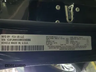 2021 Jeep Cherokee Latitude Lux z VIN 1C4PJMMXXMD240066, wystawiony jako Copart lot #88514725 z przebiegiem 19 713 mil mil oraz Szkoda całkowita • Salvage title. Historia ofert i sprzedaży dostępna na DreamBid. Obrazek 13.