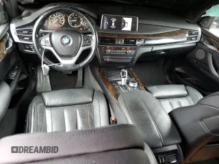 2017 BMW X5 xDrive35i z VIN 5UXKR0C53H0U52217, wystawiony jako Copart lot #58559235 z przebiegiem 100 544 mil mil oraz Szkoda całkowita • Salvage title. Historia ofert i sprzedaży dostępna na DreamBid. Obrazek 8.