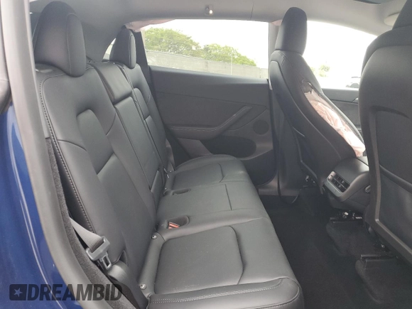 2024 Tesla Model Y Long Range with VIN 7SAYGDEE0RF176672, listed as a Copart auction lot 55622355 with 6,728 mi miles and Salvage title. Bid and sale history available at DreamBid. Image 11.