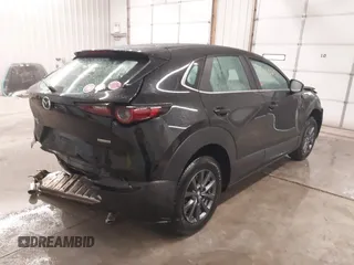 2021 Mazda CX-30 S with VIN 3MVDMBAL2MM265207, listed as a IAAI auction lot 41566325 with 62,587 mi miles and . Bid and sale history available at carsss.com. Image 4.