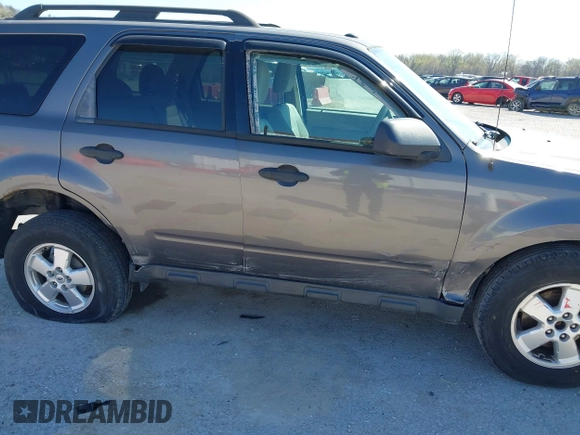 2011 Ford Escape XLT with VIN 1FMCU0D74BKA81385, listed as a IAAI auction lot 41895835 with 238,298 mi miles. Bid and sale history available at carsss.com. Image 6.