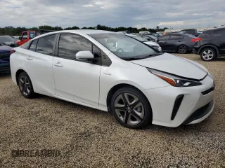 2021 Toyota Prius L Eco с VIN JTDKAMFU5M3142128, выставлен на аукционе Copart как лот 73832324 с пробегом 21 460 миль миль и Списание • Salvage title. История ставок и продаж доступна на DreamBid. Изображение 4.