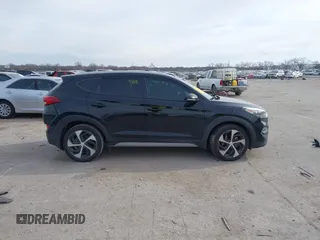 2018 Hyundai Tucson Sport with VIN KM8J33AL7JU772152, listed as a IAAI auction lot 41285203 with 87,188 mi miles. Bid and sale history available at carsss.com. Image 13.