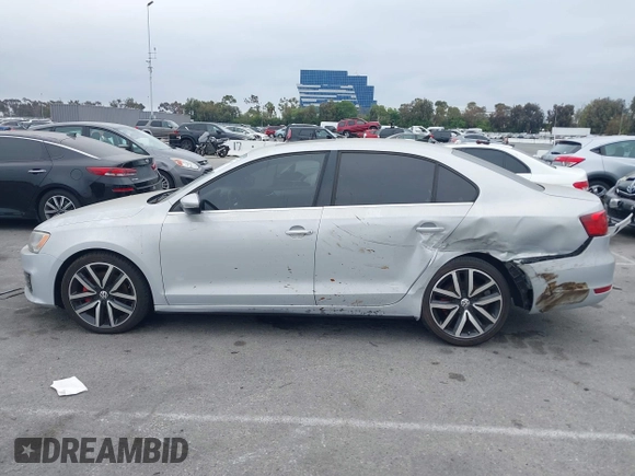 2012 Volkswagen Jetta GLI Autobahn with VIN 3VW4A7AJ1CM450205, listed as a IAAI auction lot 42421504 with 130,602 mi miles and . Bid and sale history available at DreamBid. Image 14.