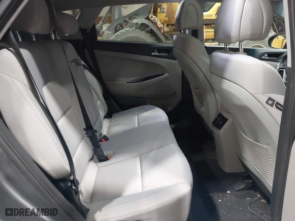 2018 Hyundai Tucson Value with VIN KM8J3CA22JU688957, listed as a IAAI auction lot 41868195 with 117,256 mi miles. Bid and sale history available at carsss.com. Image 8.