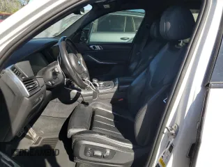 2019 BMW X5 xDrive40i with VIN 5UXCR6C50KLK86199, listed as a Copart auction lot 47523305 with 76,924 mi miles and Salvage Title. Bid and sale history available at DreamBid. Image 7.