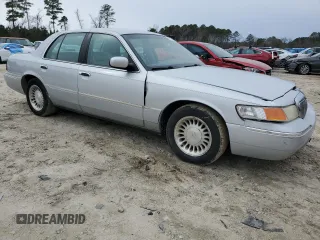 2000 Mercury Grand Marquis LS z VIN 2MEFM75W4YX722958, wystawiony jako Copart lot #47927745 z przebiegiem 148 461 mil mil oraz Szkoda całkowita • Salvage title. Historia ofert i sprzedaży dostępna na DreamBid. Obrazek 4.