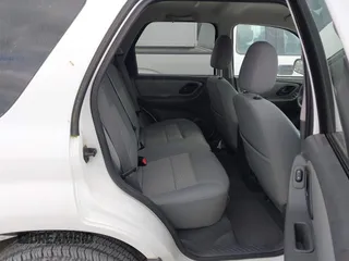 2006 Ford Escape XLT with VIN 1FMYU93196KC72975, listed as a IAAI auction lot 42088686 with 75,440 mi miles and . Bid and sale history available at DreamBid. Image 8.