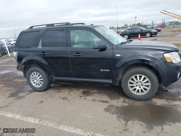 2009 Mercury Mariner Hybrid with VIN 4M2CU29319KJ18127, listed as a IAAI auction lot 41830660 with 273,438 mi miles. Bid and sale history available at carsss.com. Image 13.