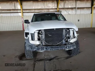 2018 Ram 1500 Tradesman with VIN 1C6RR6KGXJS219491, listed as a Copart auction lot 52093895 with 212,925 mi miles and Salvage title. Bid and sale history available at DreamBid. Image 5.