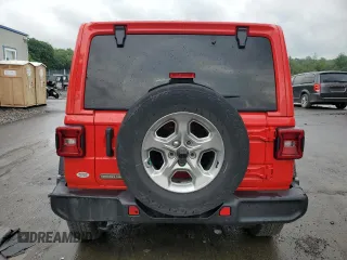 2021 Jeep Wrangler Unlimited Freedom with VIN 1C4HJXDN0MW605573, listed as a Copart auction lot 59896165 with 55,751 mi miles and Salvage title. Bid and sale history available at DreamBid. Image 6.