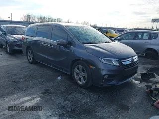 2020 Honda Odyssey EX-L z VIN 5FNRL6H7XLB023973, wystawiony jako IAAI lot #41327535 z przebiegiem 66 798 mil mil oraz . Historia ofert i sprzedaży dostępna na DreamBid. Obrazek 1.