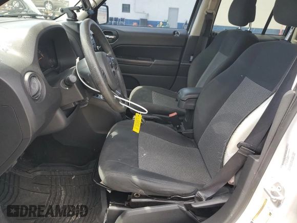 2016 Jeep Patriot Sport with VIN 1C4NJPBAXGD648790, listed as a Copart auction lot 59492765 with 96,346 mi miles and Salvage title. Bid and sale history available at DreamBid. Image 7.