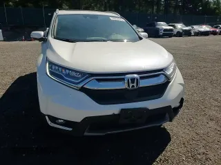 2018 Honda CR-V Touring with VIN 2HKRW2H9XJH619830, listed as a Copart auction lot 53694675 with 95,703 mi miles and Salvage title. Bid and sale history available at DreamBid. Image 11.