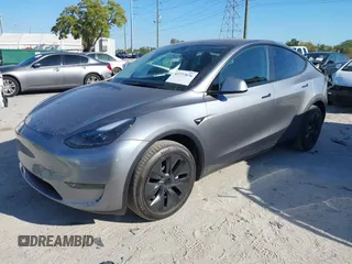 2025 Tesla Model Y Long Range with VIN 7SAYGDED7SA376233, listed as a IAAI auction lot 41777876 with 70 mi miles and . Bid and sale history available at DreamBid. Image 21.