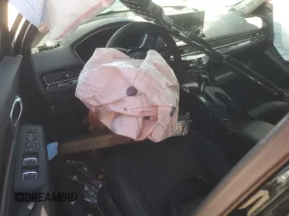 2024 Honda Civic EX-L z VIN 19XFL1H79RE021846, wystawiony jako Copart lot #85976734 z przebiegiem Nie podano mil oraz Szkoda całkowita • Salvage title. Historia ofert i sprzedaży dostępna na DreamBid. Obrazek 8.