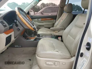 2003 Lexus GX 470 z VIN JTJBT20X830012682, wystawiony jako Copart lot #59507195 z przebiegiem 267 158 mil mil oraz Tytuł czysty. Historia ofert i sprzedaży dostępna na DreamBid. Obrazek 7.