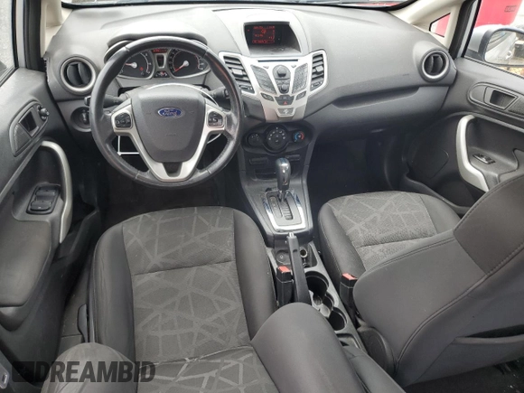 2013 Ford Fiesta SE z VIN 3FADP4BJ9DM108667, wystawiony jako Copart lot #58542295 z przebiegiem 94 812 mil mil oraz Szkoda całkowita • Salvage title. Historia ofert i sprzedaży dostępna na DreamBid. Obrazek 8.