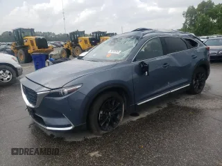 2023 Mazda CX-9 Carbon Edition with VIN JM3TCBDY0P0632207, listed as a Copart auction lot 56162925 with 34,515 mi miles and Salvage title. Bid and sale history available at DreamBid. Image 1.