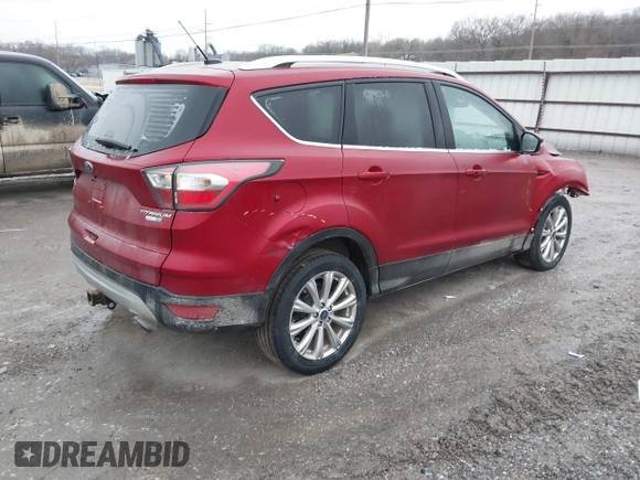 2017 Ford Escape Titanium with VIN 1FMCU9J95HUA48807, listed as a IAAI auction lot 41522636 with 218,342 mi miles. Bid and sale history available at carsss.com. Image 4.