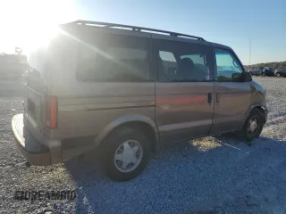 1998 GMC Safari with VIN 1GKDM19W4WB538303, listed as a Copart auction lot 76885334 with 319,225 mi miles and Salvage Title. Bid and sale history available at carsss.com. Image 3.