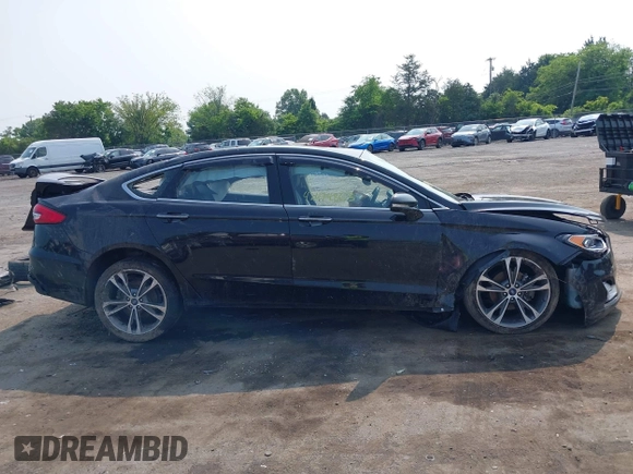 2019 Ford Fusion Titanium with VIN 3FA6P0D92KR247270, listed as a IAAI auction lot 42474803 with Not provided miles and . Bid and sale history available at DreamBid. Image 12.