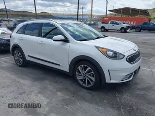 2017 Kia Niro Touring with VIN KNDCE3LC3H5070998, listed as a IAAI auction lot 41448651 with 54,760 mi miles. Bid and sale history available at carsss.com. Image 1.