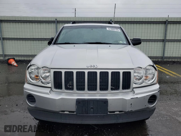 2005 Jeep Grand Cherokee Laredo with VIN 1J4GR48K55C719634, listed as a Copart auction lot 61809195 with 141,316 mi miles and Salvage title. Bid and sale history available at DreamBid. Image 5.