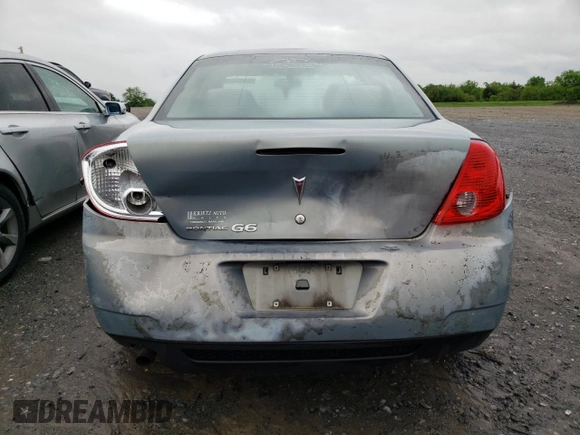 2009 Pontiac G6 1SB z VIN 1G2ZJ57B394251694, wystawiony jako Copart lot #56733065 z przebiegiem 210 351 mil mil oraz Szkoda całkowita • Salvage title. Historia ofert i sprzedaży dostępna na DreamBid. Obrazek 6.