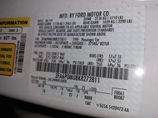2019 Ford Fusion Hybrid SEL with VIN 3FA6P0MU8KR272811, listed as a IAAI auction lot 41705282 with 56,565 mi miles. Bid and sale history available at carsss.com. Image 9.