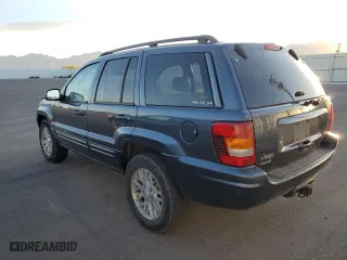 2003 Jeep Grand Cherokee Limited with VIN 1J4GW58N03C561385, listed as a Copart auction lot 75777094 with 169,705 mi miles and Salvage Title. Bid and sale history available at carsss.com. Image 2.