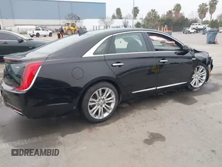 2018 Cadillac XTS Luxury with VIN 2G61M5S33J9119684, listed as a IAAI auction lot 41659807 with 107,156 mi miles and . Bid and sale history available at DreamBid. Image 4.