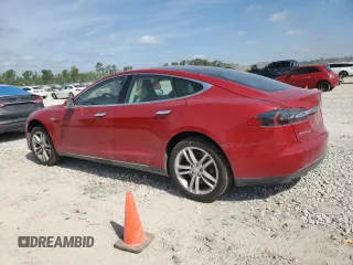 2014 Tesla Model S 60 with VIN 5YJSA1H13EFP30664, listed as a Copart auction lot 53142305 with 113,995 mi miles and Salvage Title. Bid and sale history available at DreamBid. Image 2.