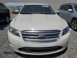 2011 Ford Taurus SEL with VIN 1FAHP2EW0BG160421, listed as a Copart auction lot 56014075 with 212,421 mi miles and Clean Title. Bid and sale history available at carsss.com. Image 5.