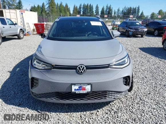 2021 Volkswagen ID.4 Pro S z VIN WVGTMPE20MP058882, wystawiony jako IAAI lot #42317440 z przebiegiem 64 473 mil mil oraz . Historia ofert i sprzedaży dostępna na DreamBid. Obrazek 12.