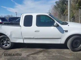 2002 Ford F-150 XL with VIN 1FTRX17L32NA13159, listed as a IAAI auction lot 41653814 with 435,395 mi miles. Bid and sale history available at carsss.com. Image 13.