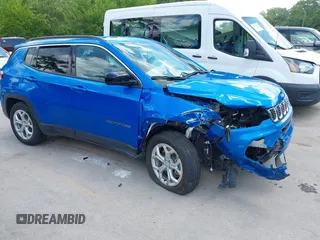 2024 Jeep Compass Latitude with VIN 3C4NJDBNXRT118589, listed as a IAAI auction lot 42597240 with 32,098 mi miles and . Bid and sale history available at DreamBid. Image 1.